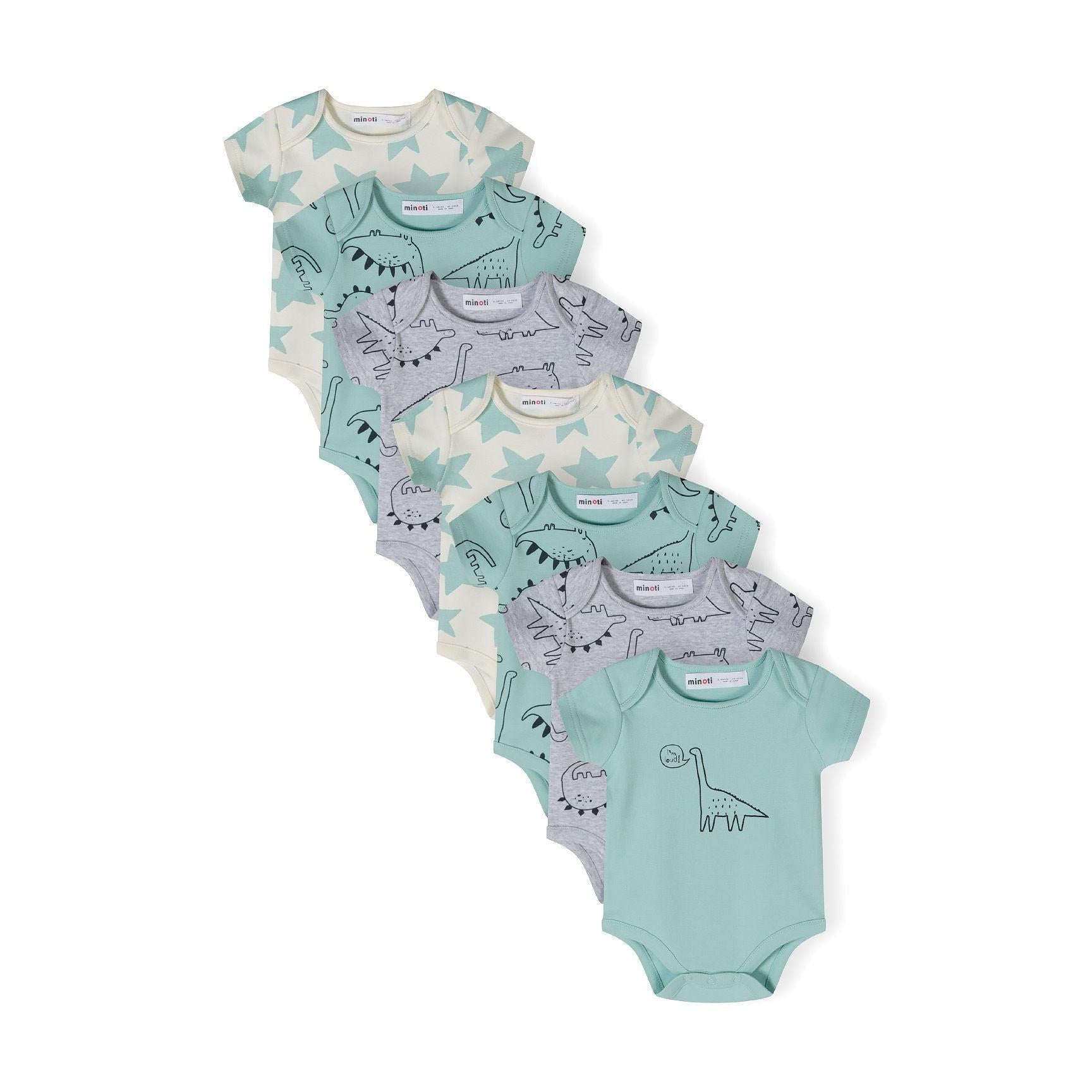 Seven mint green short sleeve baby bodysuits arranged in a fan layout against white background, featuring dinosaur prints and plain designs with Minoti labels visible