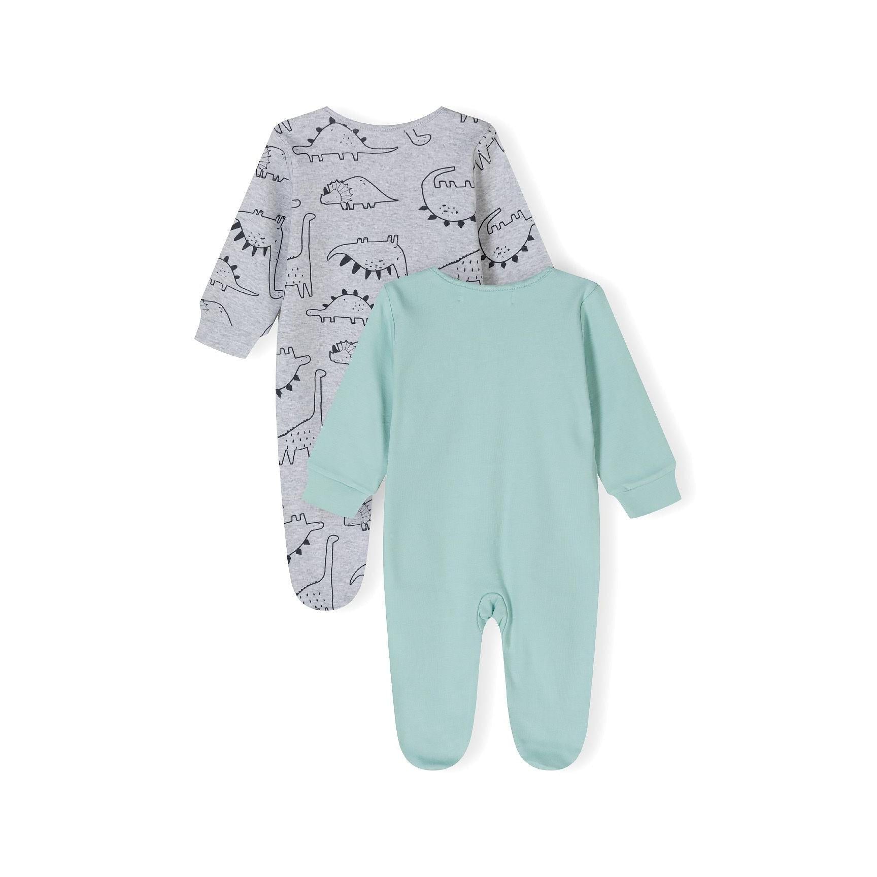 Close-up of mint sleepsuit front showing white dinosaur graphic and be brave text