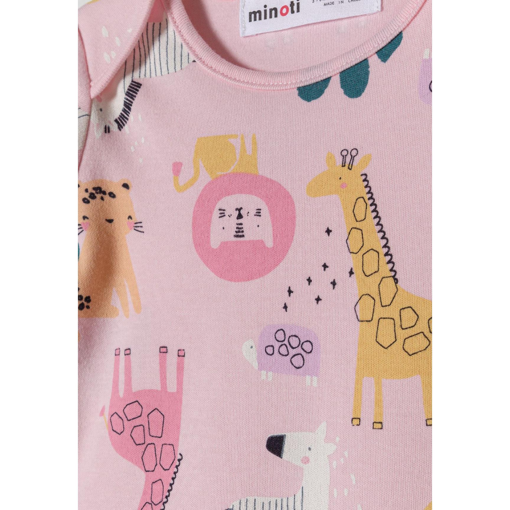Close-up detail of pink bodysuit showing safari animal print with giraffe, lion, elephant and zebra characters with Minoti label visible
