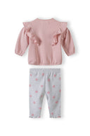 Girls long sleeve sweatshirt with frill shoulder and rib legging set light pink 3-24m. Soft cotton fleece with frilled sleeves and polka dot leggings.
