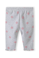 Gray ribbed leggings with pink polka dots and ruffled hem for girls aged 3-24m. Soft and comfortable for everyday wear.