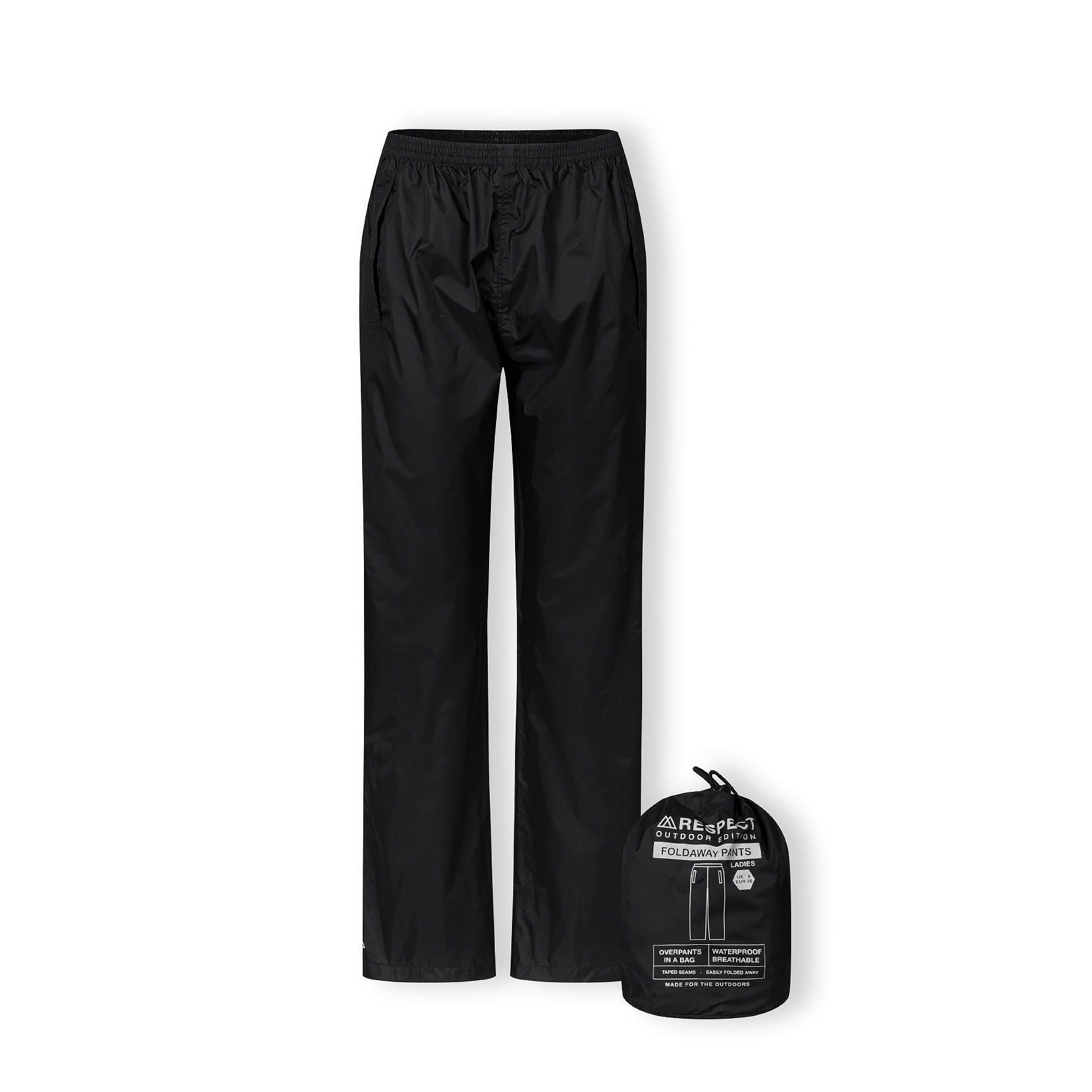 Close-up detail of black waterproof pants showing elastic waistband and taped seams