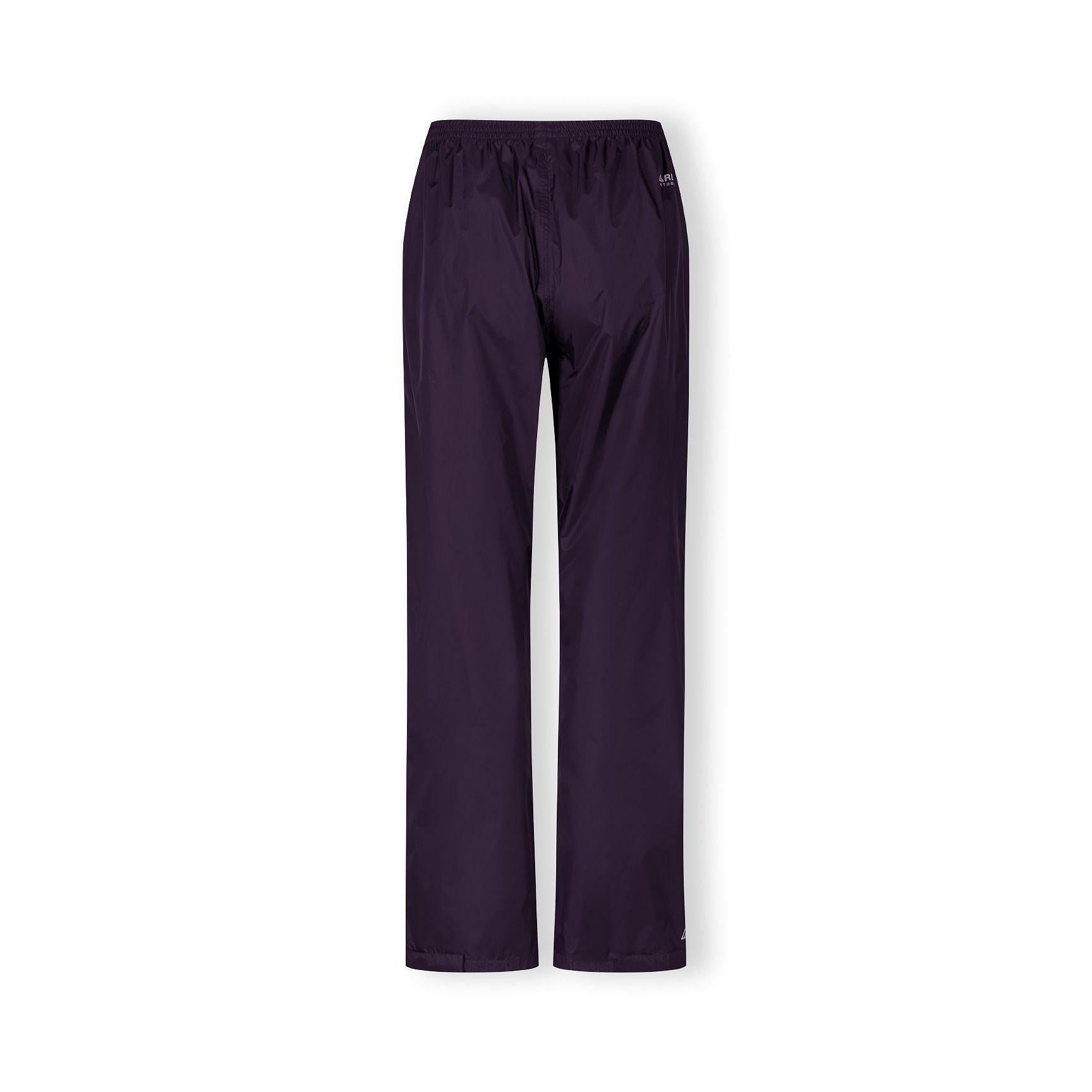 Close-up detail of purple waterproof overpants showing elasticated waistband with gathered fabric and seam construction