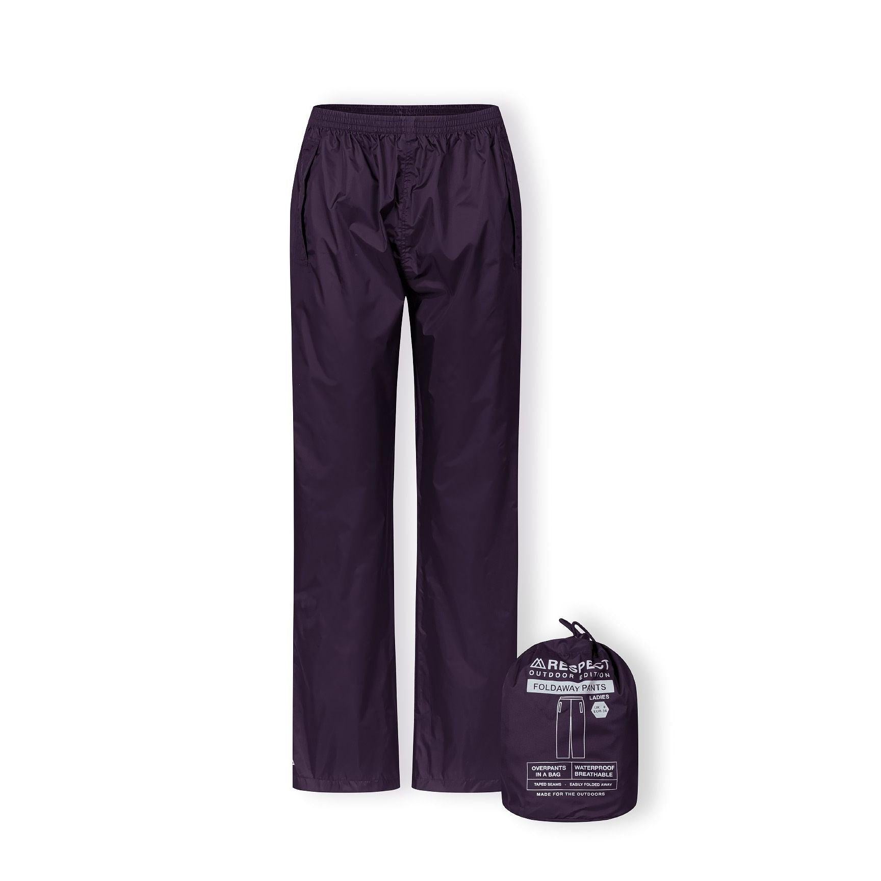 Purple waterproof overpants laid flat with small purple storage bag, showing packaway feature and Regatta branding label