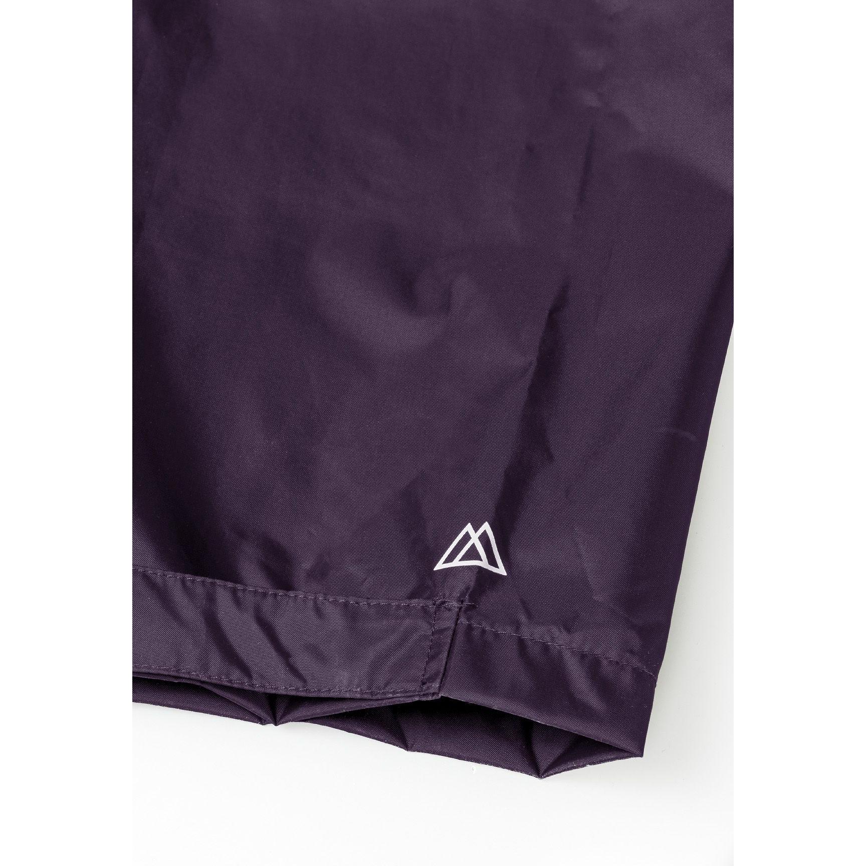 Close-up detail of purple waterproof overpants showing elasticated waistband with gathered fabric and seam construction