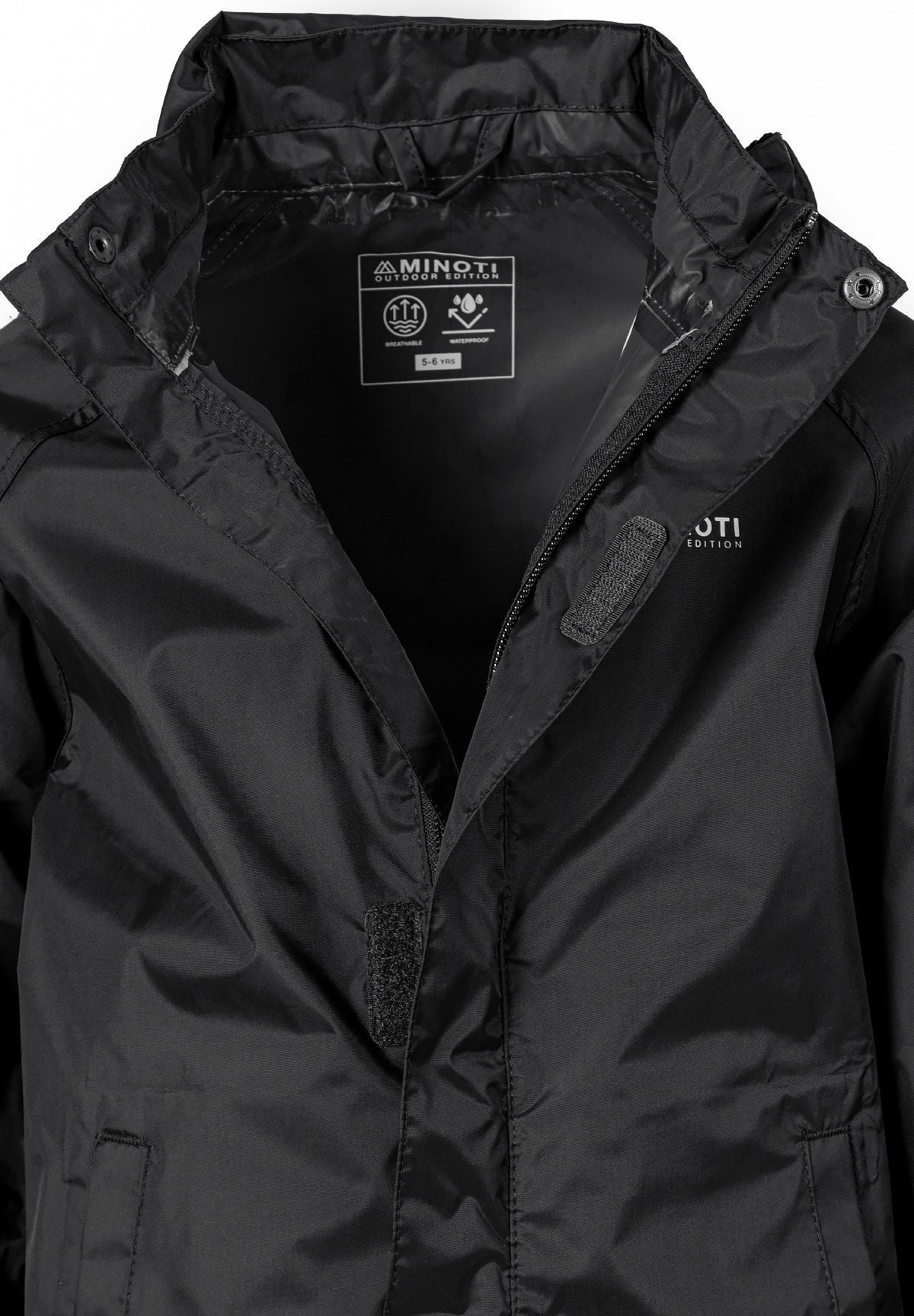 Close-up of the fastening on the black packaway hooded jacket.