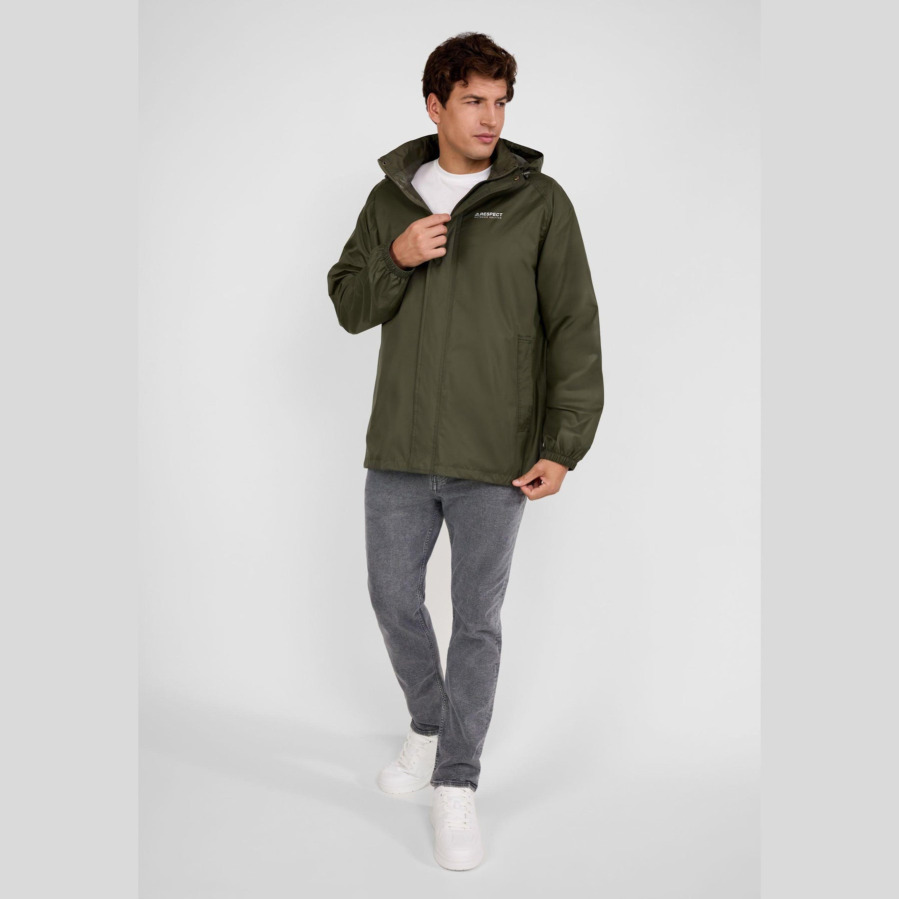 Front view of khaki packaway waterproof jacket laid flat showing full zip closure, concealed hood and chest branding on white background