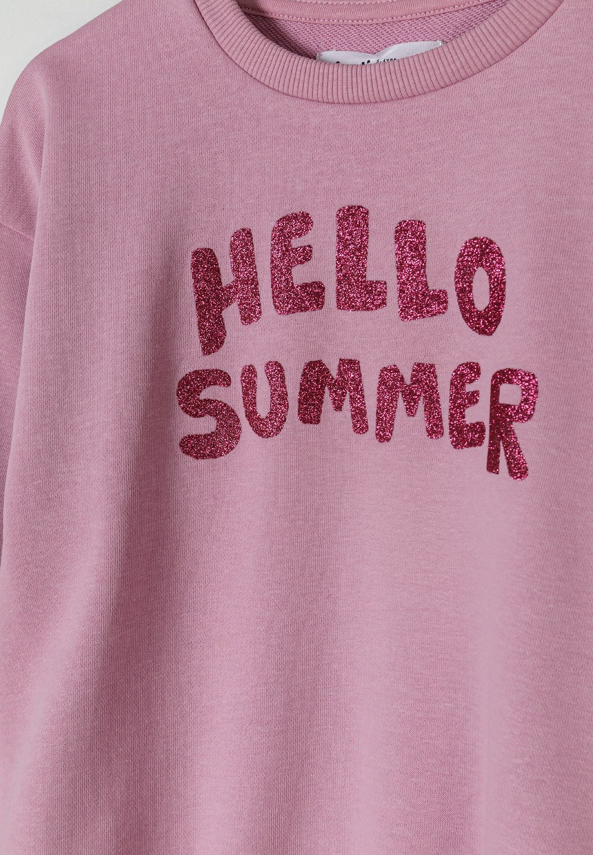 Dusty pink crew neck sweatshirt, glitter lettering detail.