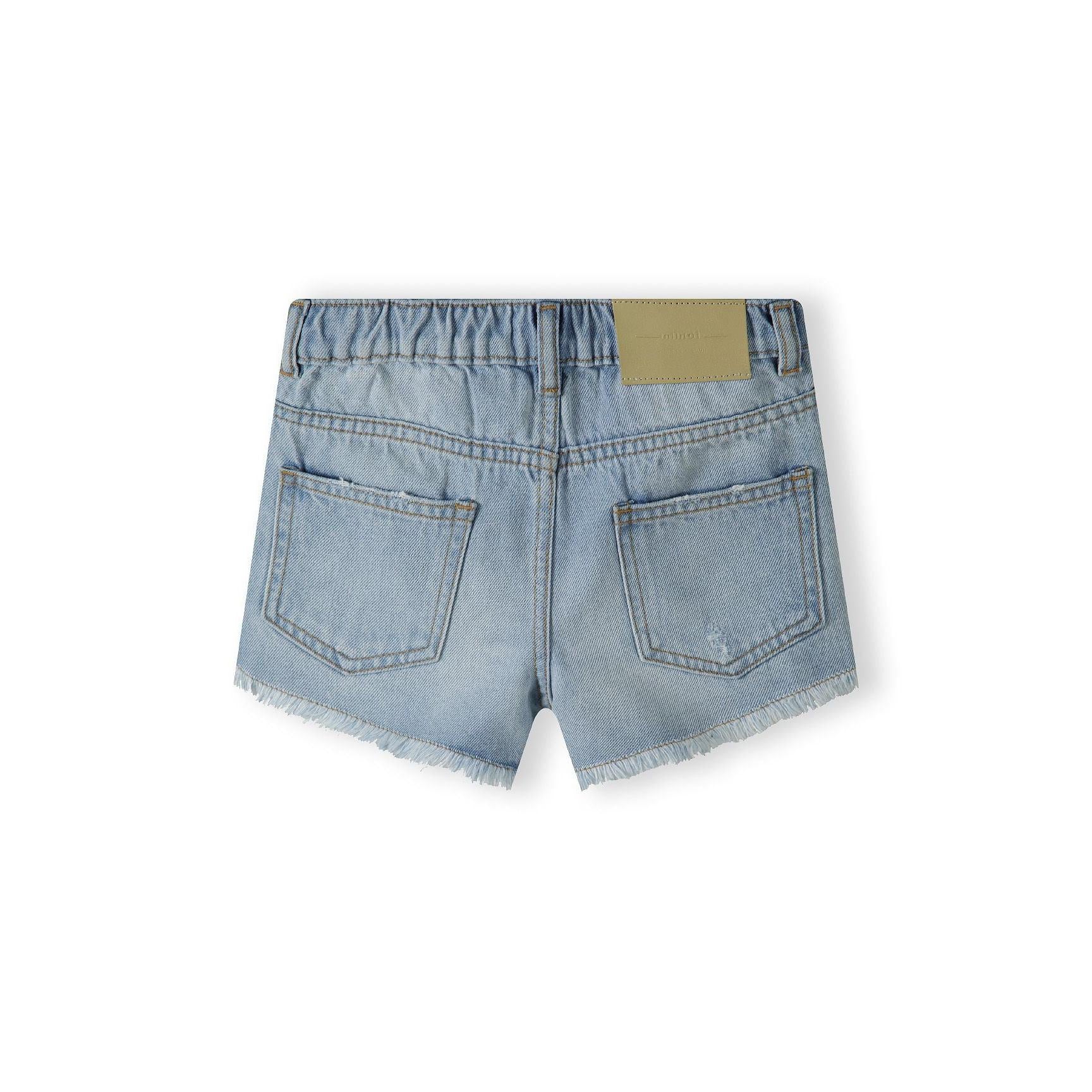 Back view of light blue denim shorts showing frayed hem detail, elastic waistband and back pockets on white background