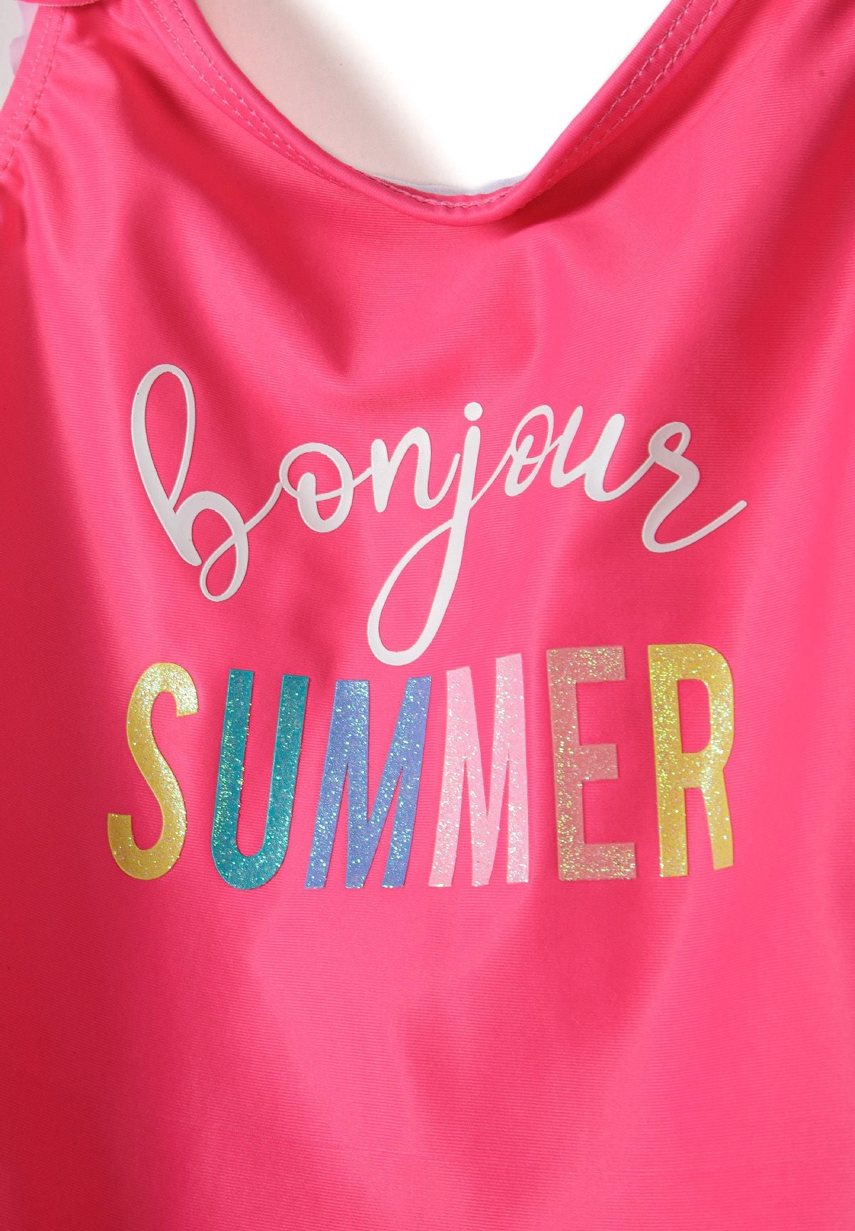 Pink and multicolour frill-strap swimsuits, pink lettering detail.