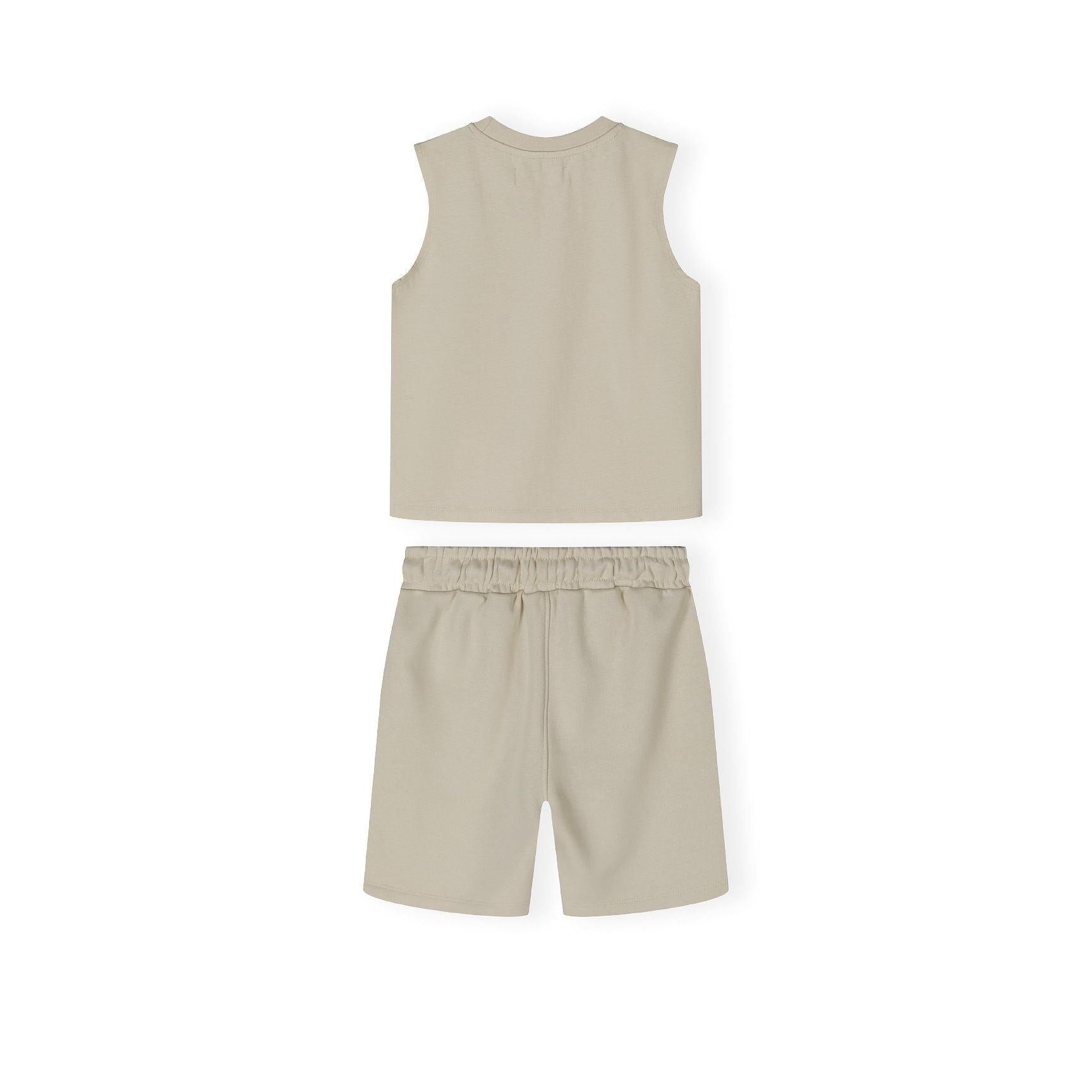 Close-up detail of beige shorts waistband showing elasticated fabric and black drawstring toggle