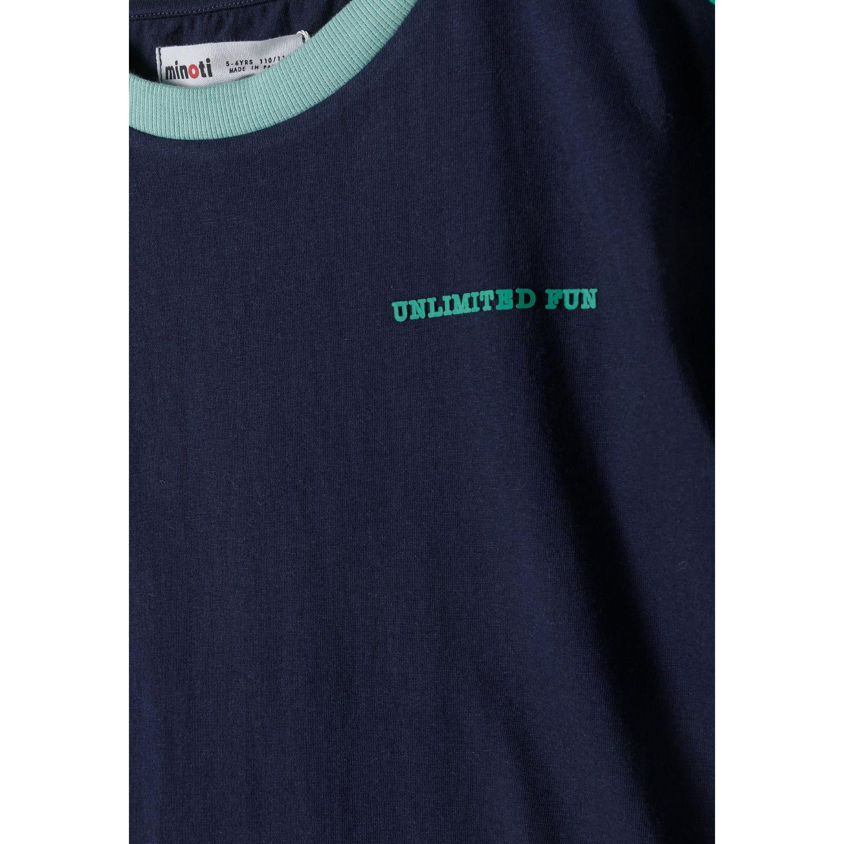 Bright green fleece shorts laid flat showing elasticated waistband and relaxed fit on white background