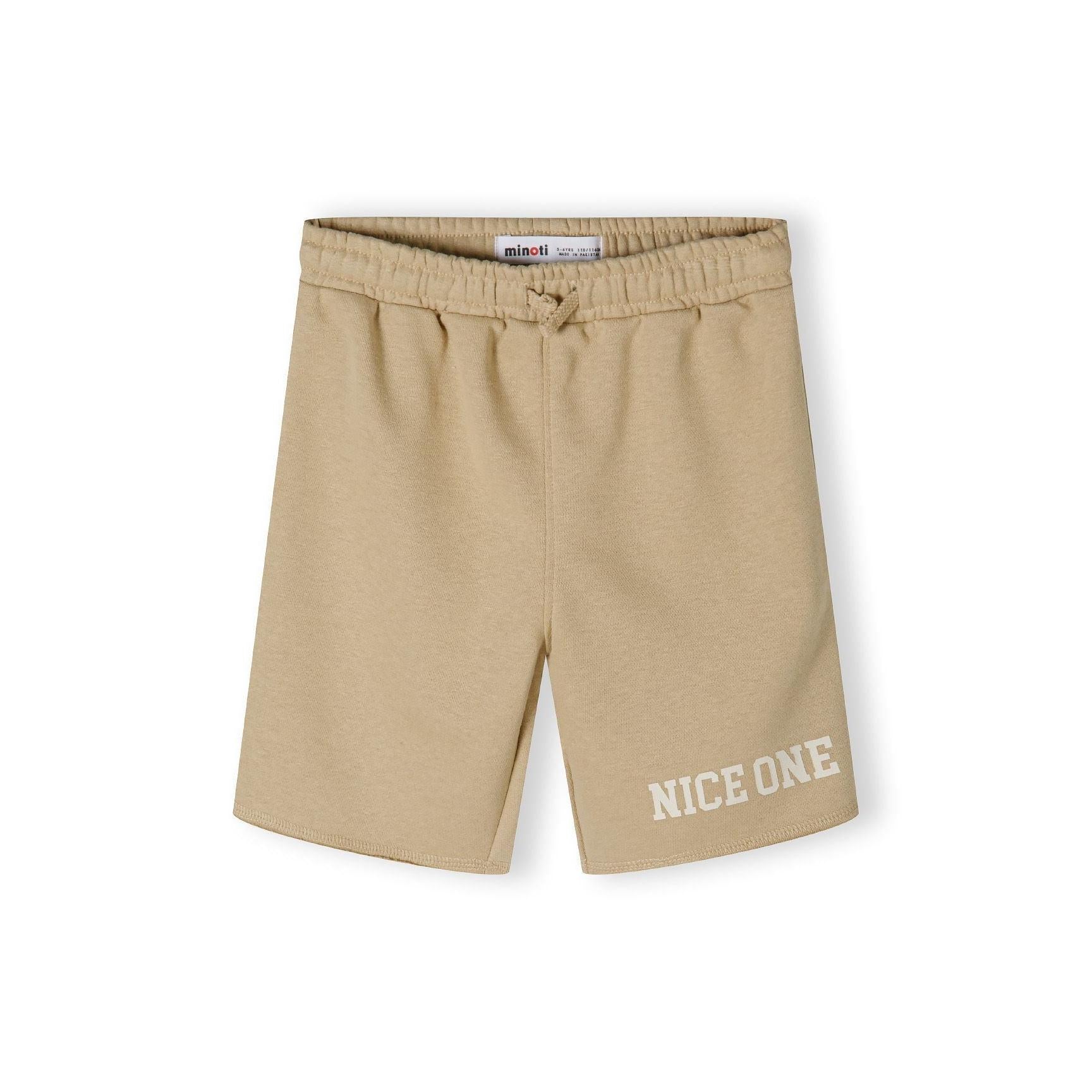 Close-up detail of beige fleece shorts waistband showing elasticated band with woven drawstring tie