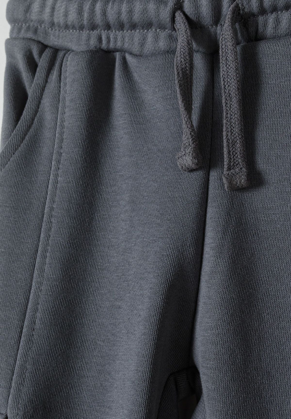 Grey cargo joggers, waist detail.
