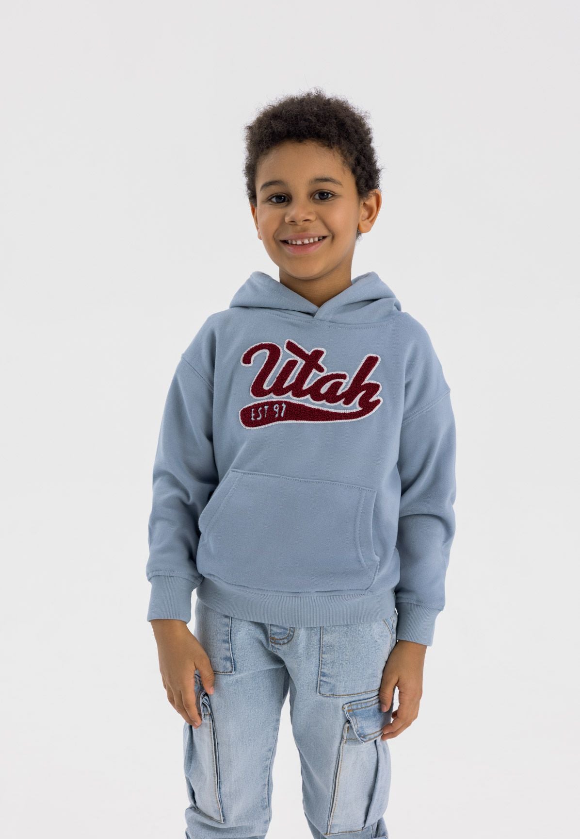 Light blue pullover hoodie, model front.