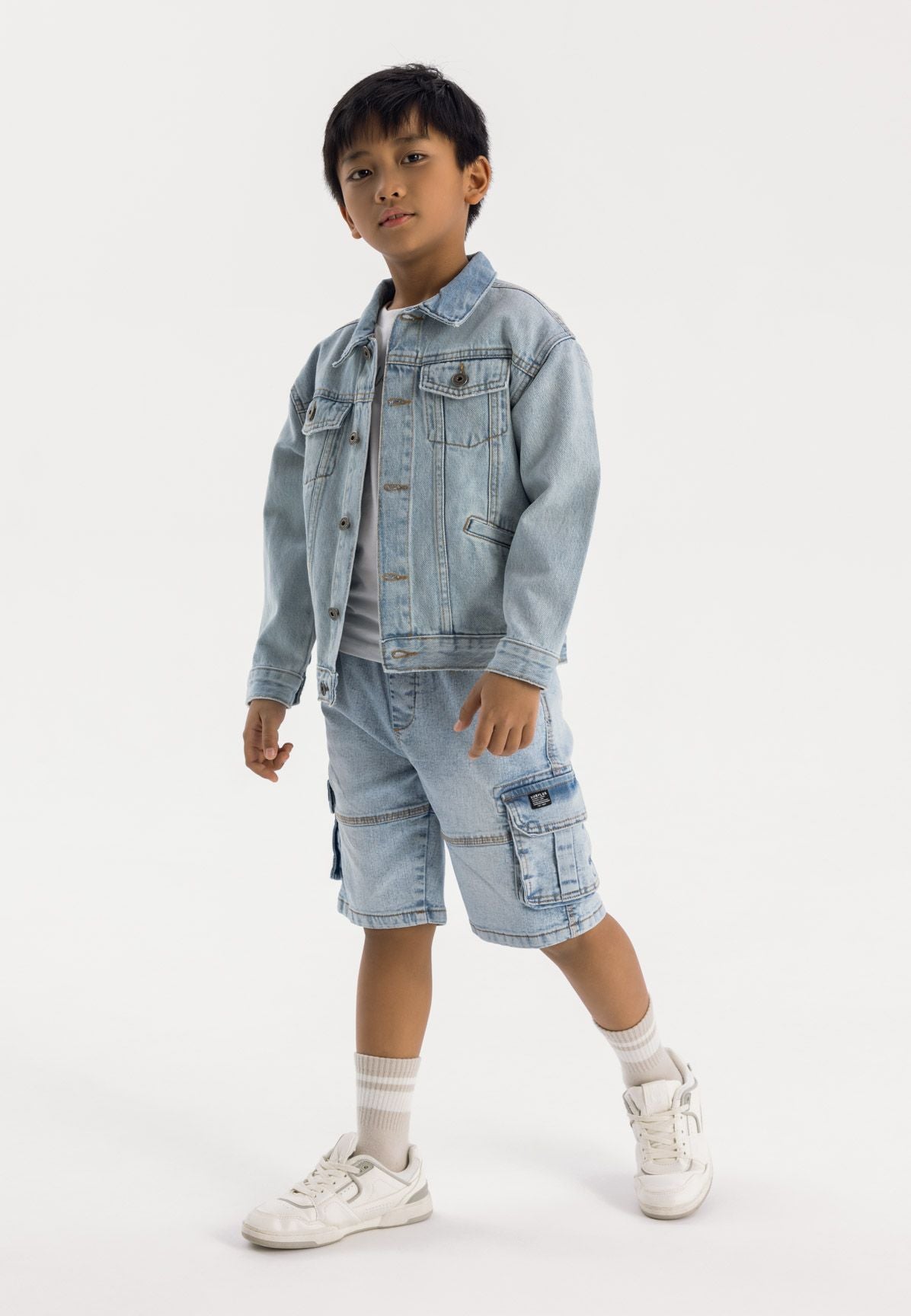 Light blue denim cargo shorts, worn front.