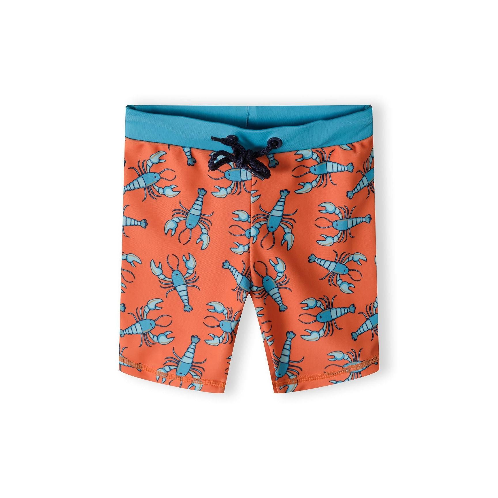 Close-up of coral orange swim shorts with blue waistband showing detailed lobster print pattern on white background