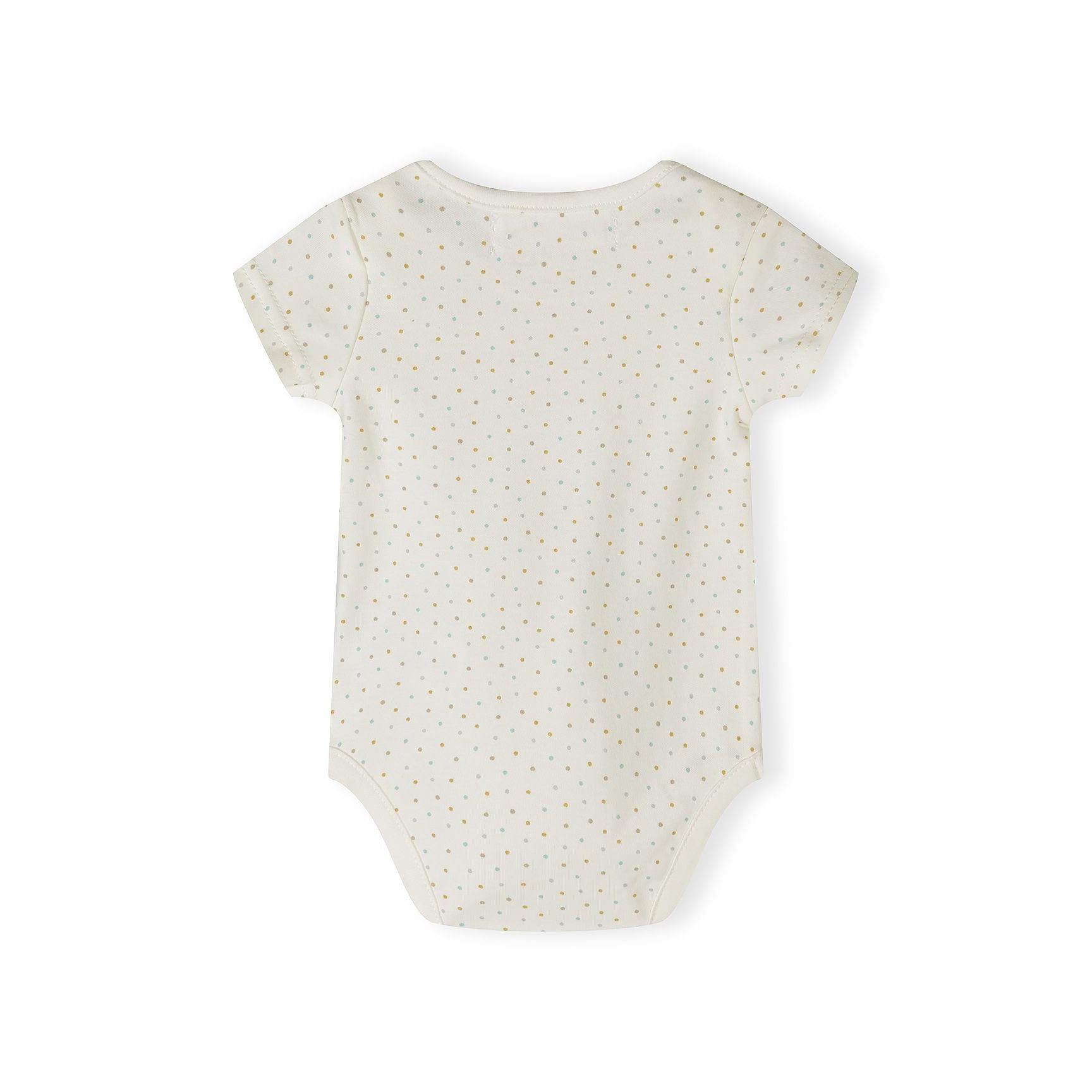 Close-up detail of cream bodysuit showing Minoti label and colorful polka dot pattern in yellow, mint, grey and coral