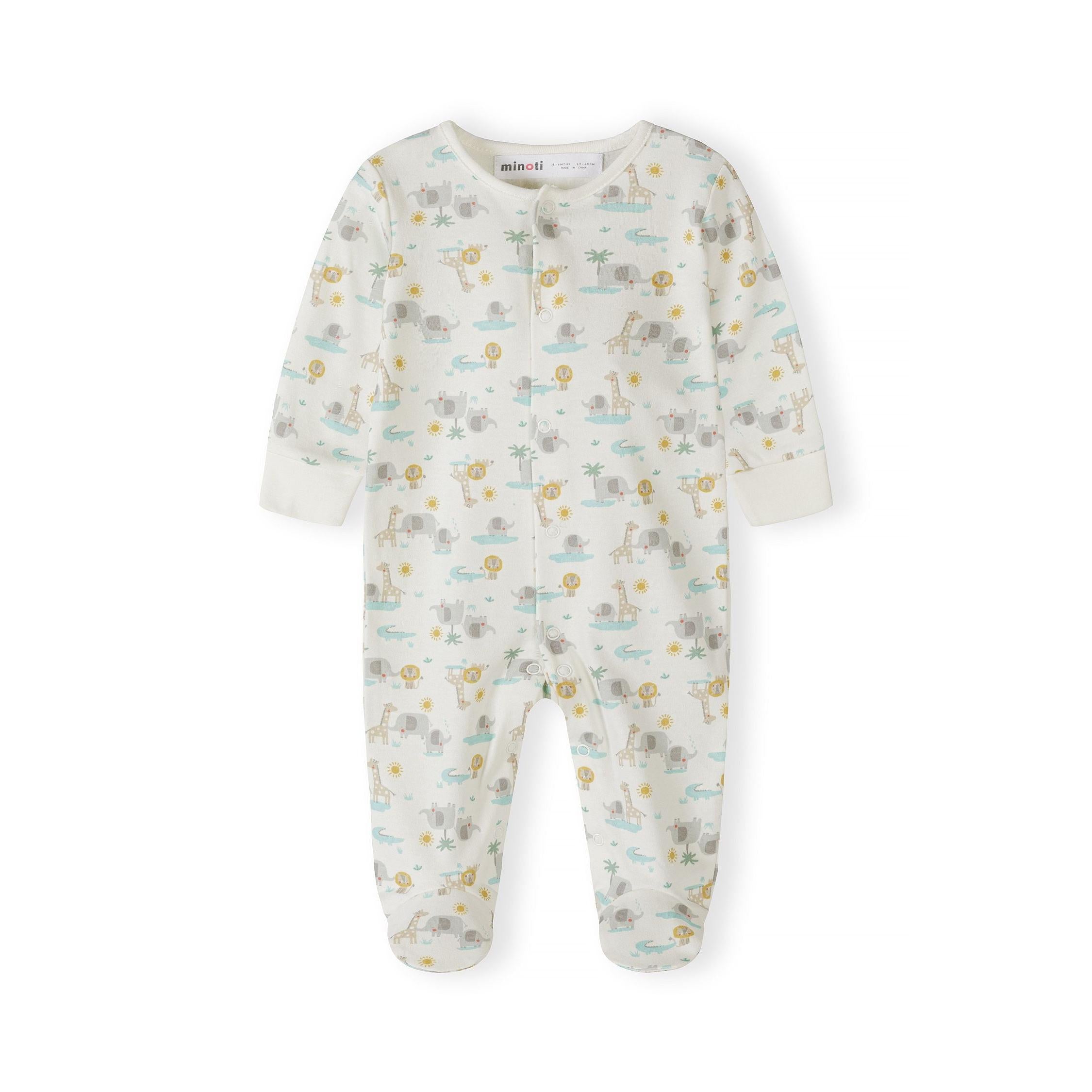 Cream cotton drawstring gift bag with natural cord ties and small wooden star charm on white background