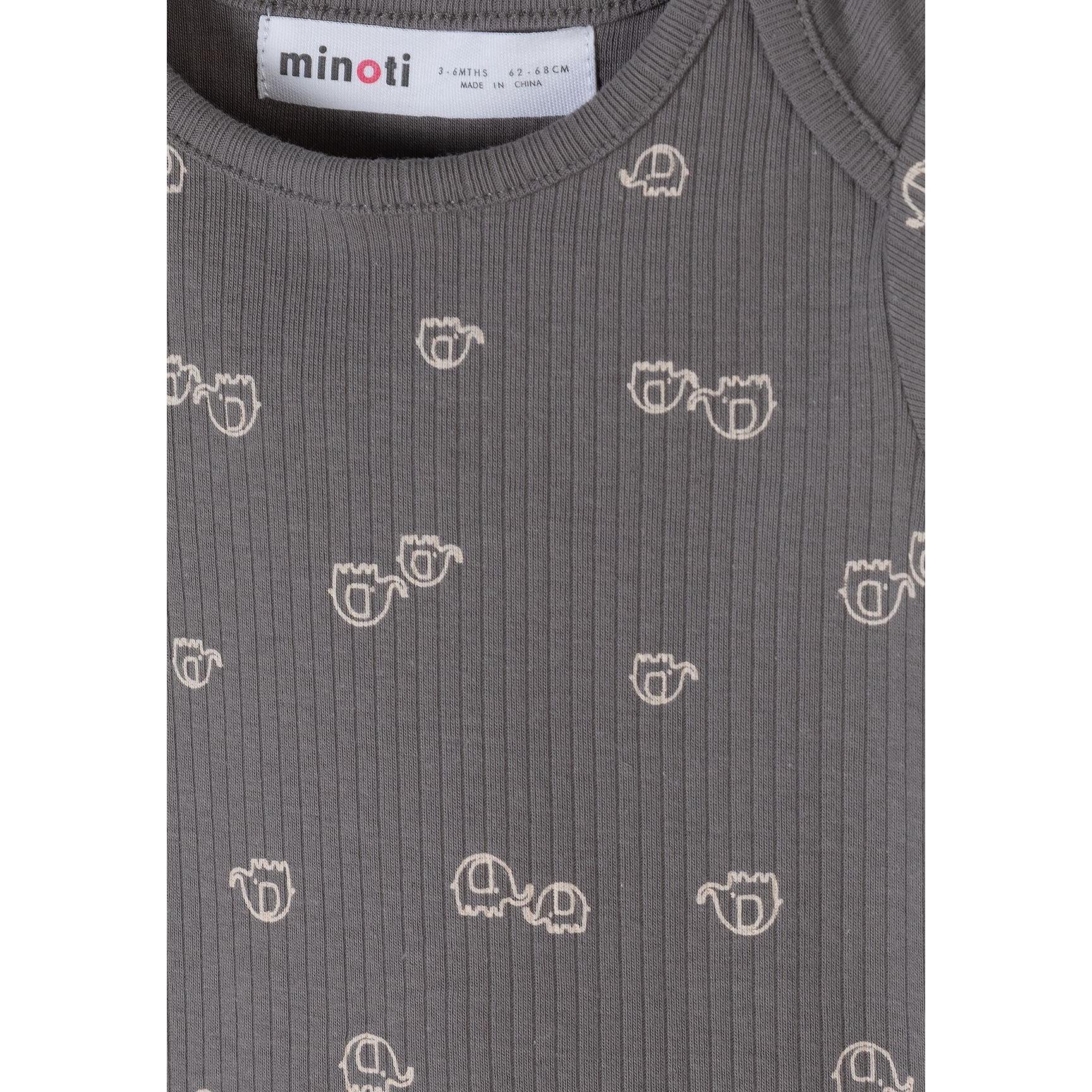 Detailed view of grey bodysuit fabric showing ribbed texture and repeated white elephant print pattern with Minoti brand label visible