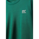 Close-up of green sweatshirt showing Great Days New Adventure white text print