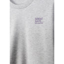 Close-up detail of grey sweatshirt showing chest print text reading 'GREAT DAYS... NEW ADVENTURE' in purple lettering