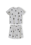 Close-up detail of cream ribbed fabric texture showing hand-drawn black hearts print pattern and crew neckline