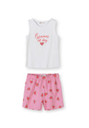 Close-up detail of pink elastic waistband shorts with watermelon heart pattern print, showing Minoti label and fabric texture