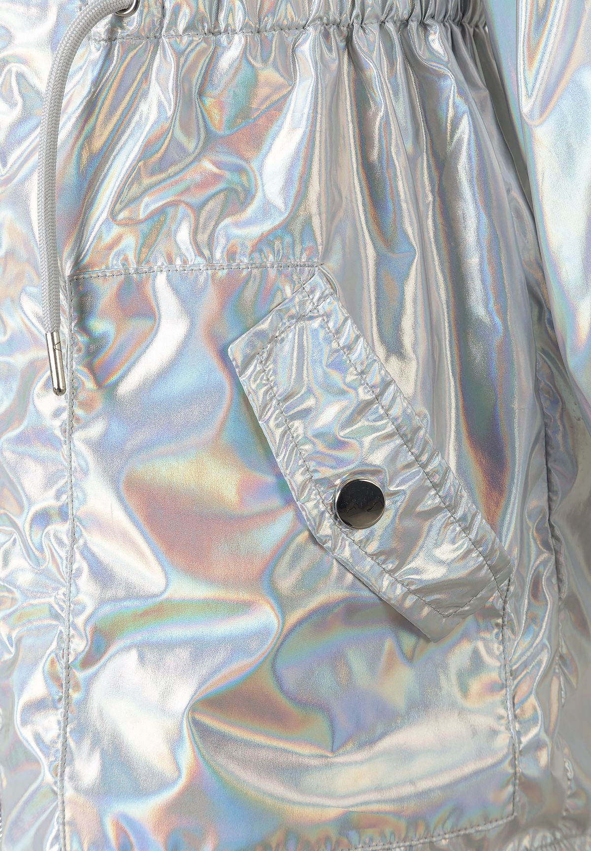 Close-up of the waist and pocket on the silver metallic parka.