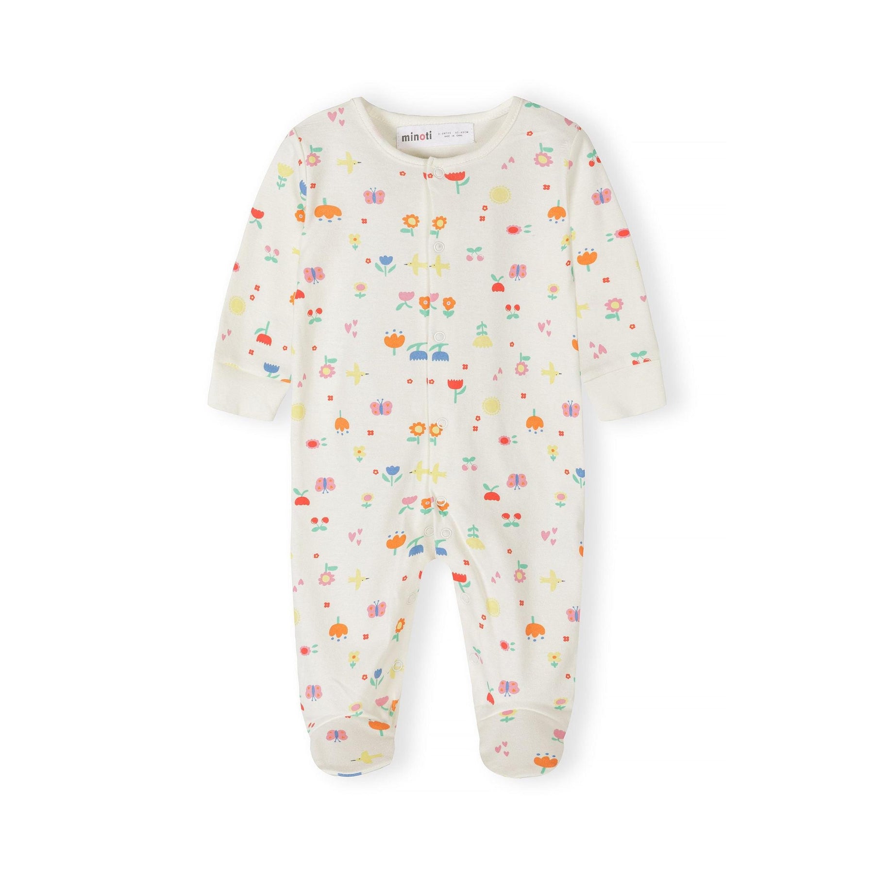 Close-up of mint green sleepsuit with pink and orange floral pattern and matching ribbed cuffs, showing front button closure