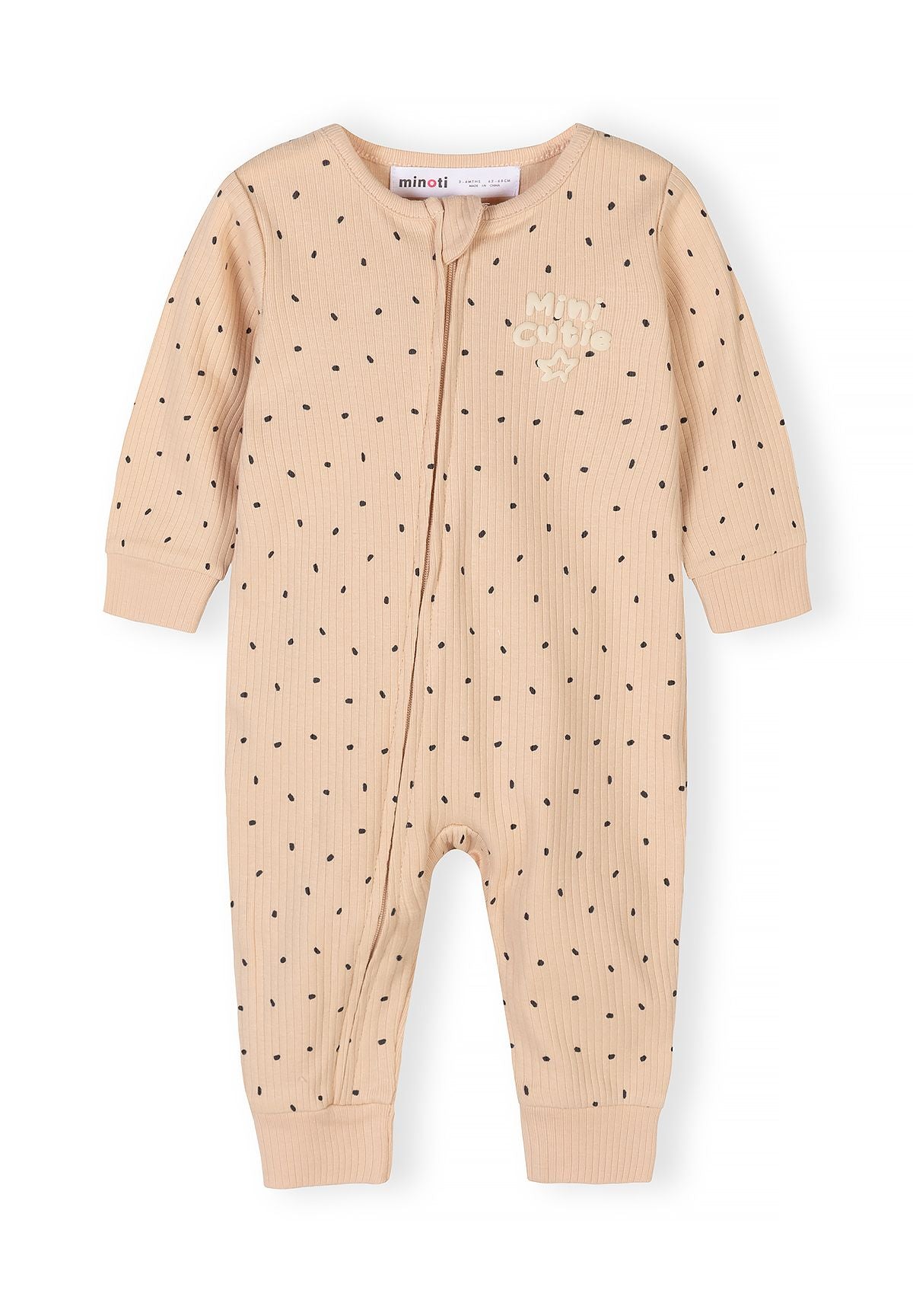 Detail of a beige rib-knit romper for baby boys with long sleeves and press-stud fastening.