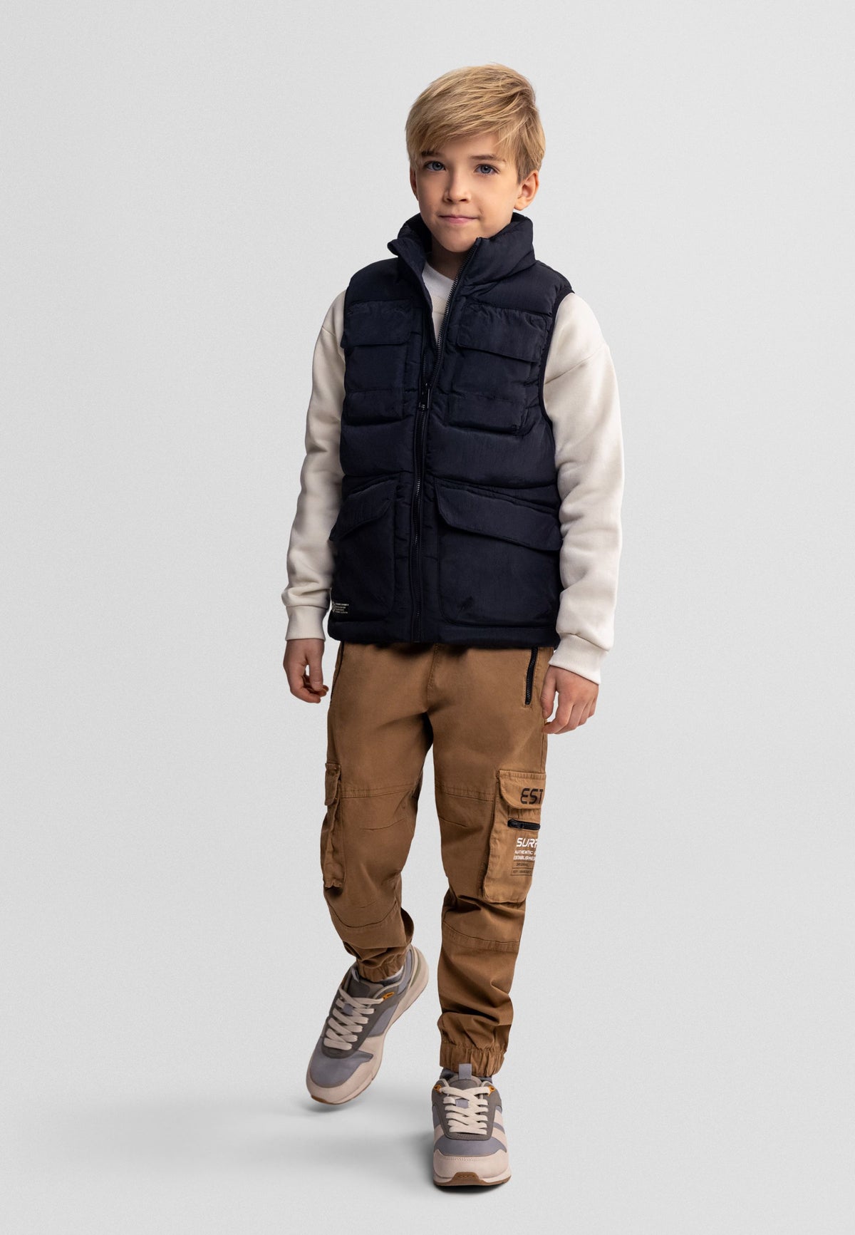Black utility padded gilet, model front.