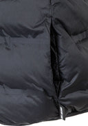 Close-up of quilted black polyester waistcoat pocket with visible stitching and fabric texture detail