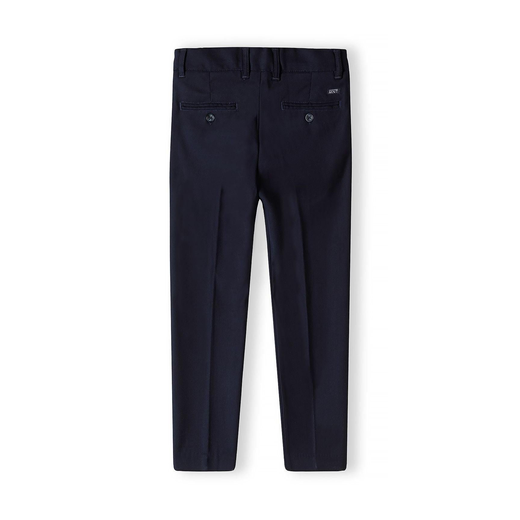 Close-up detail of navy formal trouser waistband showing button closure and Minoti brand label
