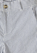Detail of navy striped tailored shorts with button and side pocket.