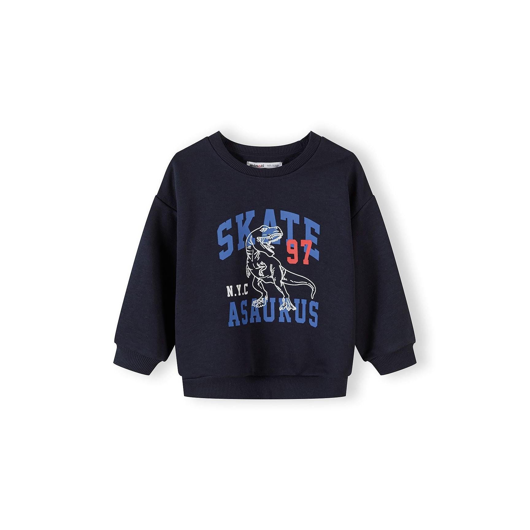 Close-up of navy sweatshirt showing skateboard dinosaur graphic with text 'SKATE 97 N.Y.C ASAURUS' on front