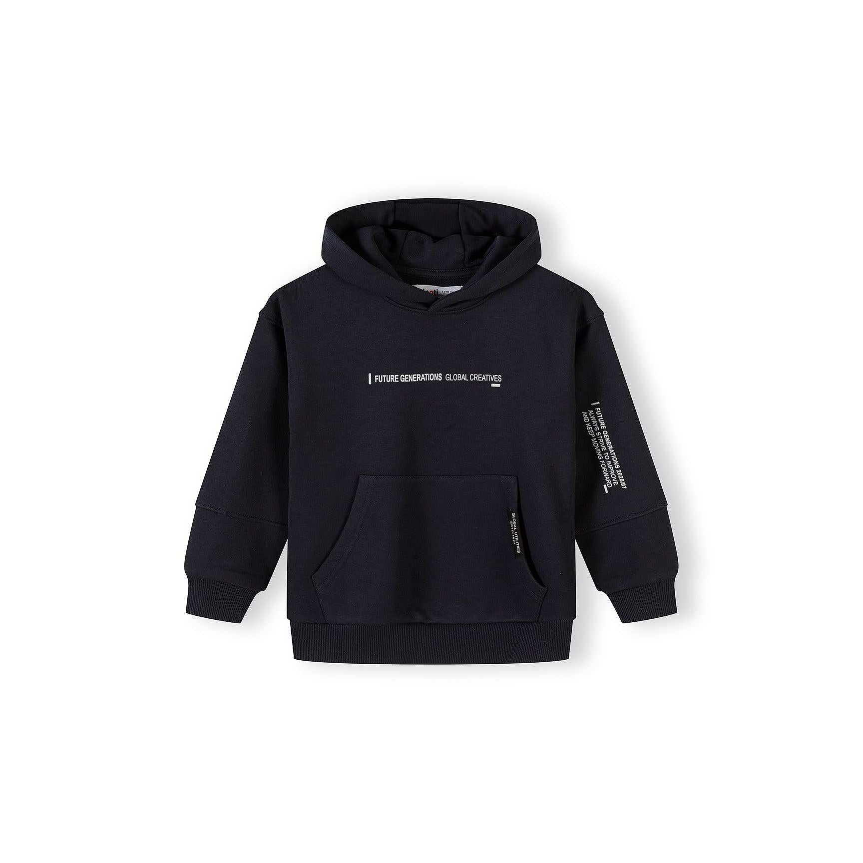 Close-up front view of black joggers showing elasticated waistband with drawstring and text detail on leg