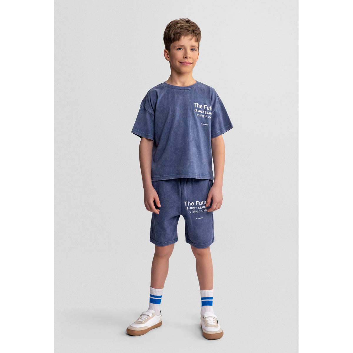 Boys' t-shirt and shorts set in washed blue — complete product view for square Shop card
