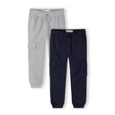 Two cargo joggers laid flat - grey on left, navy on right, showing multiple side pockets and ribbed cuffs on white background