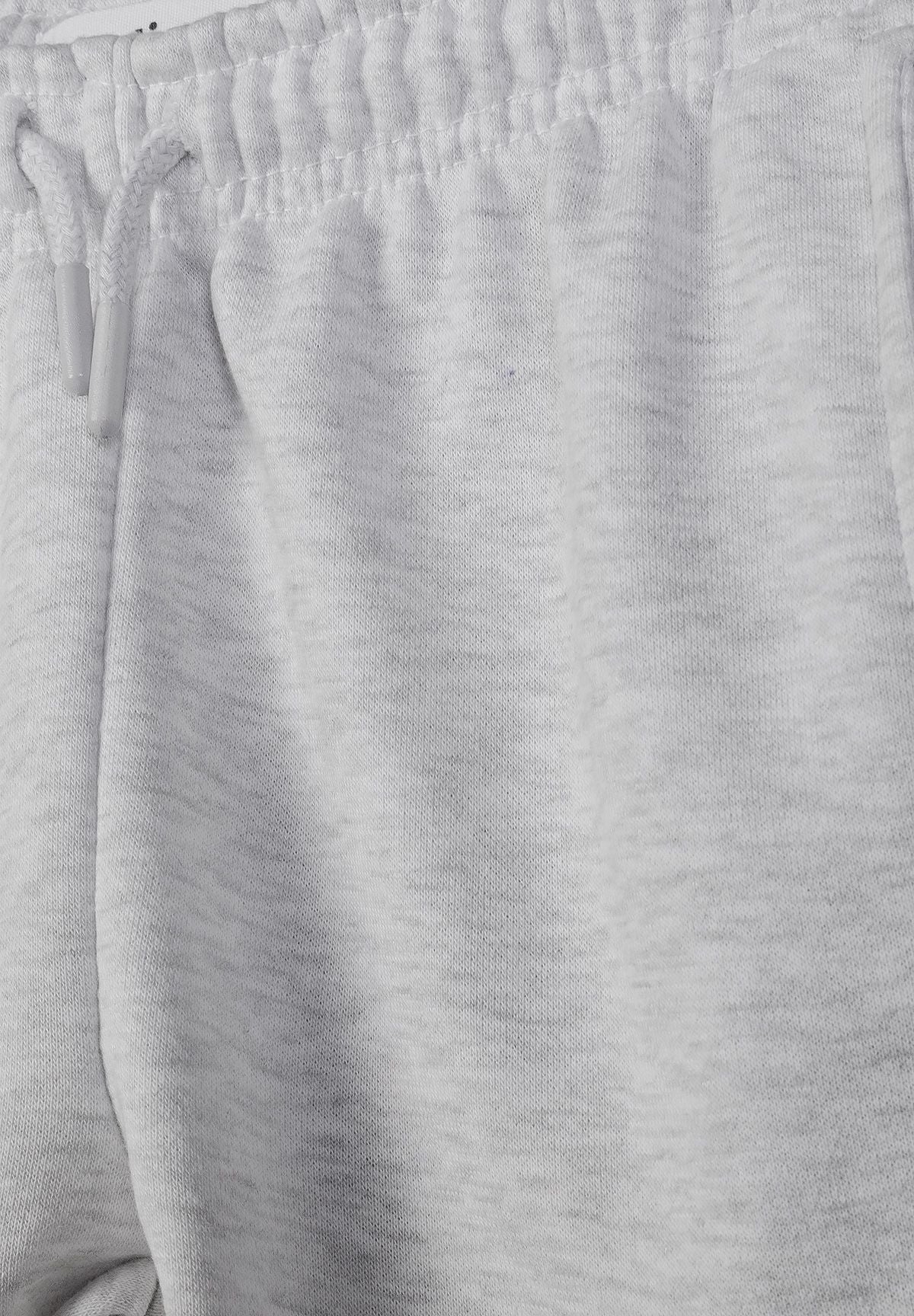 Detail of boys grey cargo joggers with elastic waistband and drawstring.