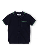 Boys navy blue knitted polo shirt, short-sleeved, with collar and chest pocket.