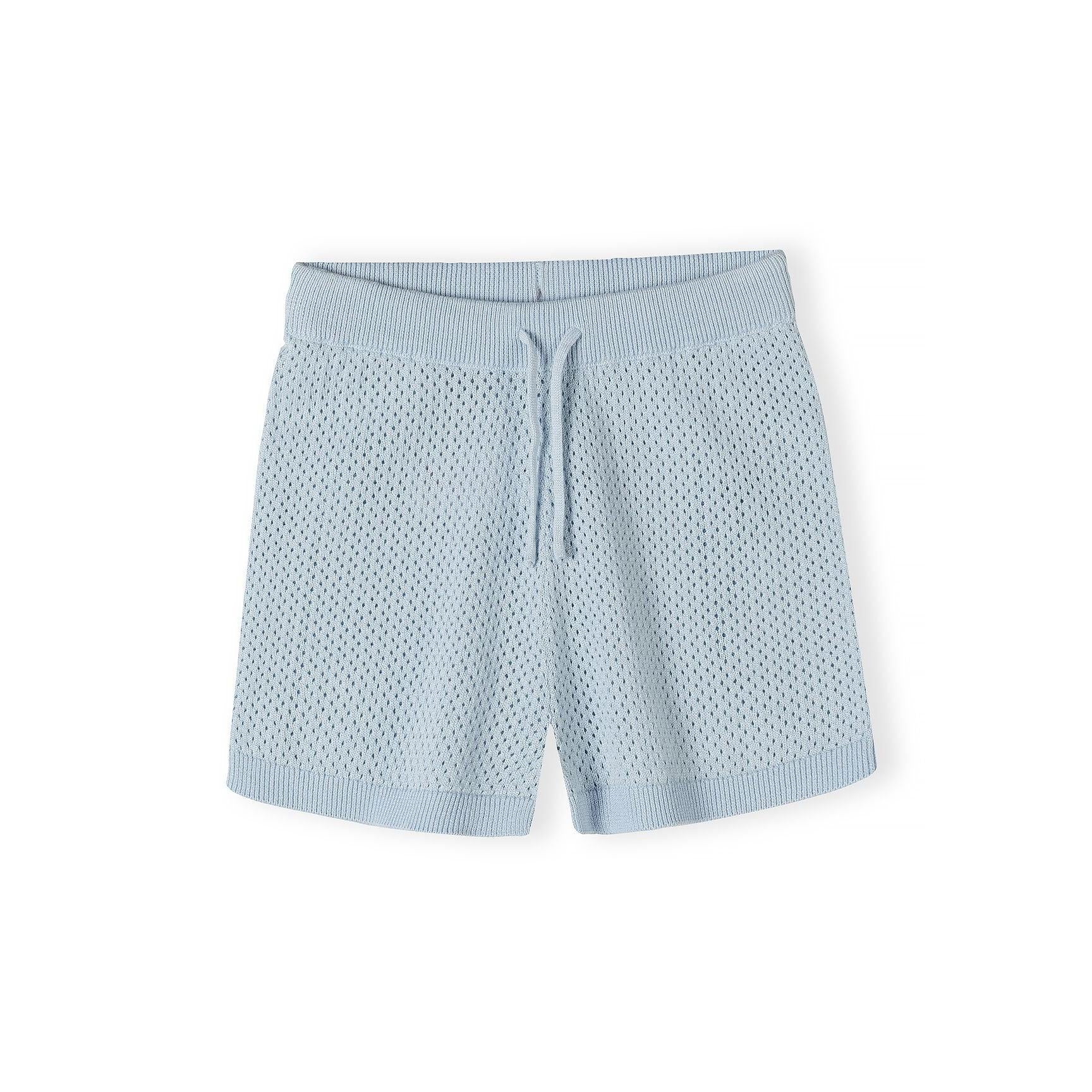 Close-up detail of light blue knitted shorts showing mesh texture, elasticated waistband with drawstring ties