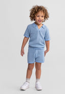 Boys light blue knitted polo shirt and shorts set, front view, featuring a lapel collar and elastic waistband.