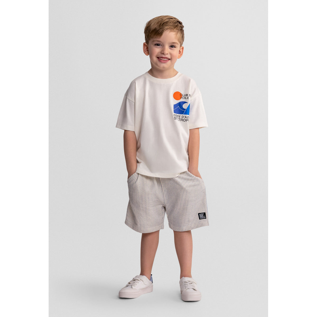 Boys' t-shirt and shorts set in cream and blue — complete product view for square Shop card