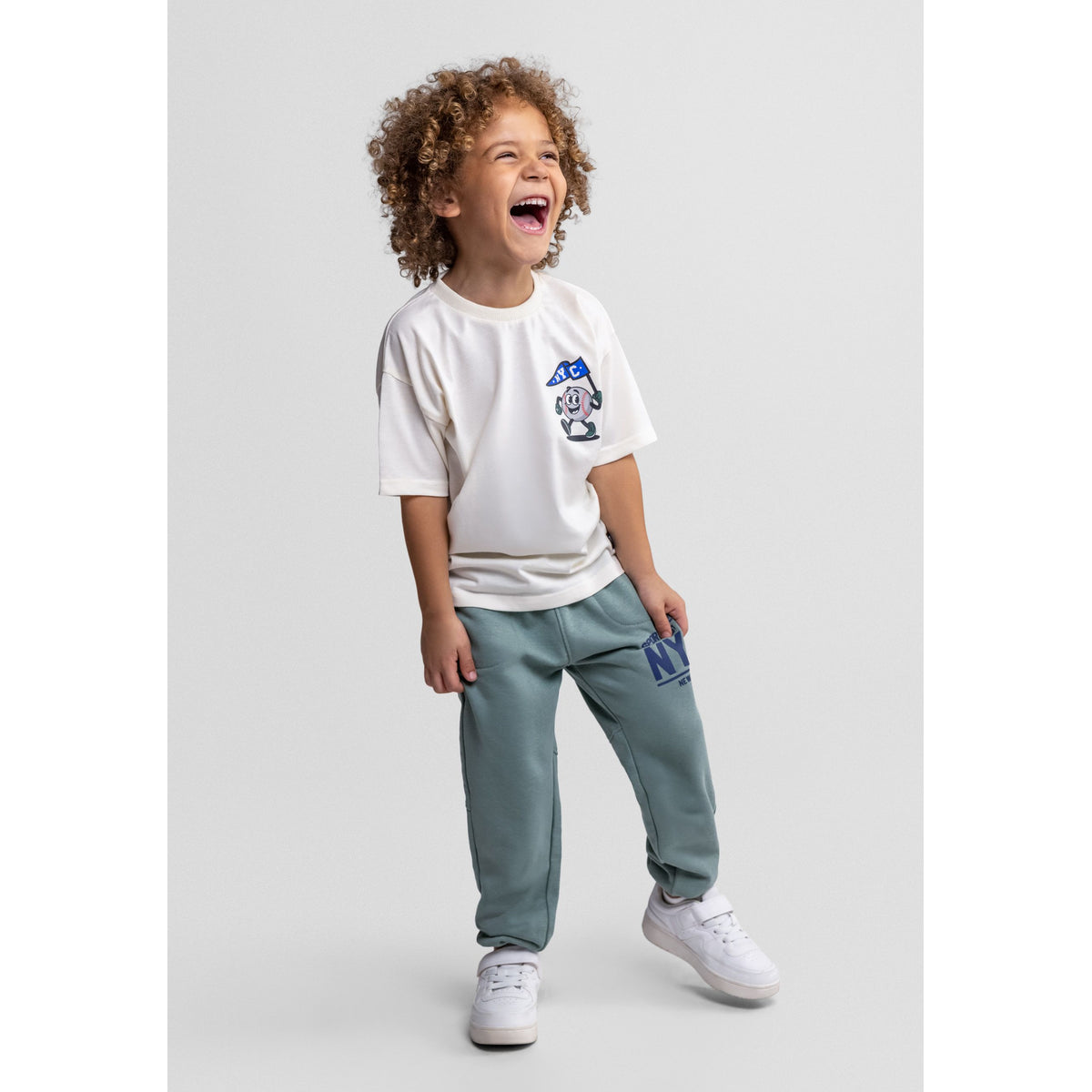 Boys' t-shirt and joggers set in cream and sage green — complete product view for square Shop card