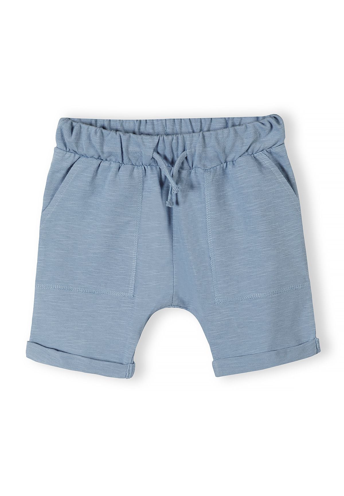 Detail of blue boys' cotton jersey shorts with adjustable drawstring and side pockets.