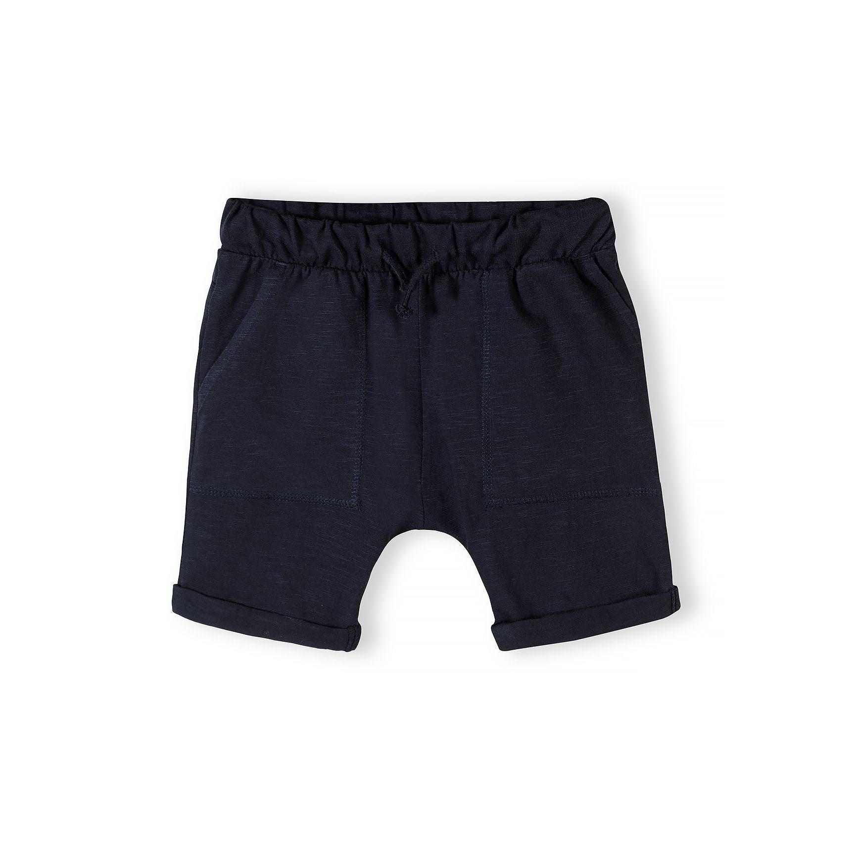 Single navy blue cotton jersey shorts with drawstring waist and rolled hem cuffs shown against white background