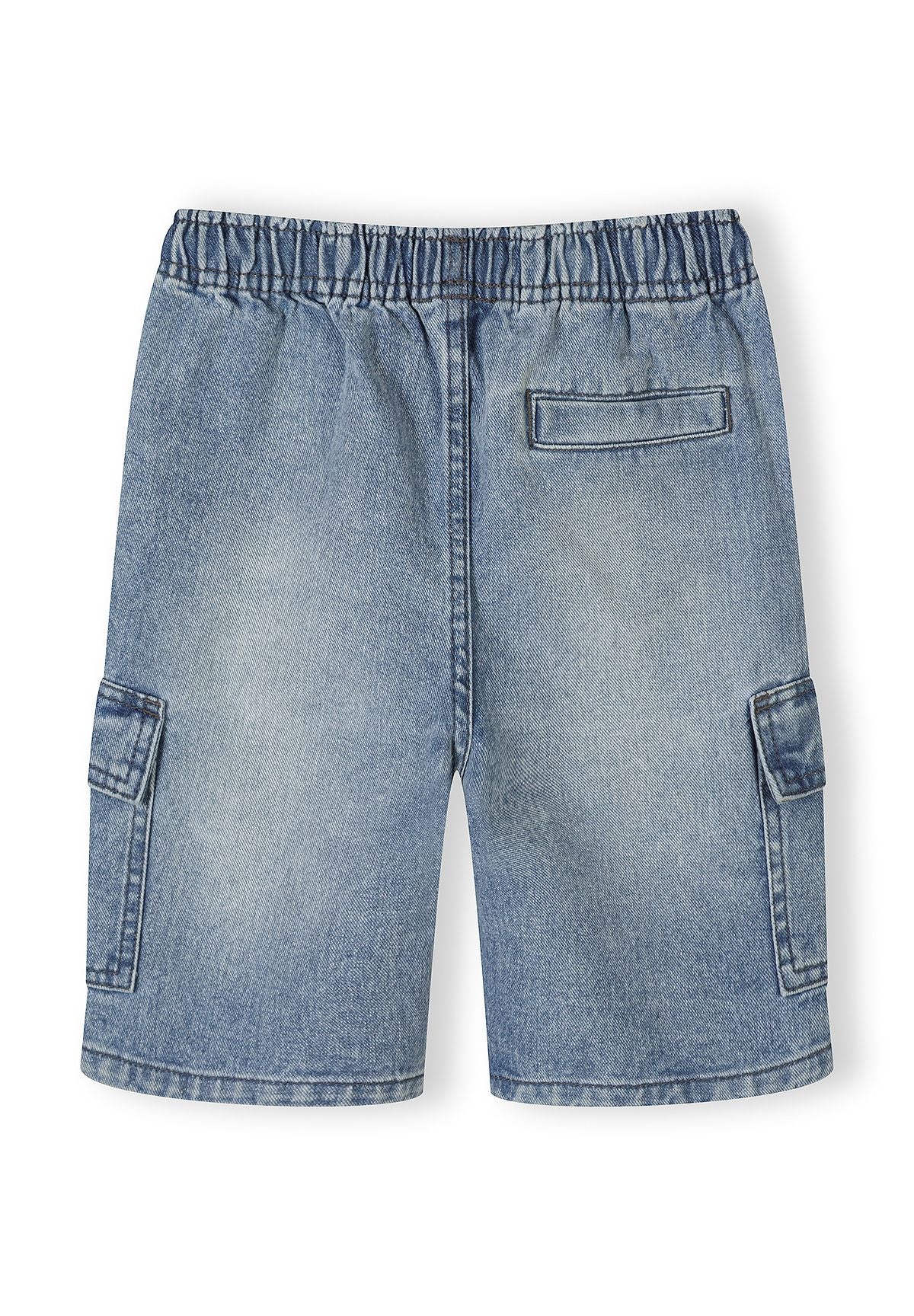 Back view of light blue denim combat shorts with cargo pockets.