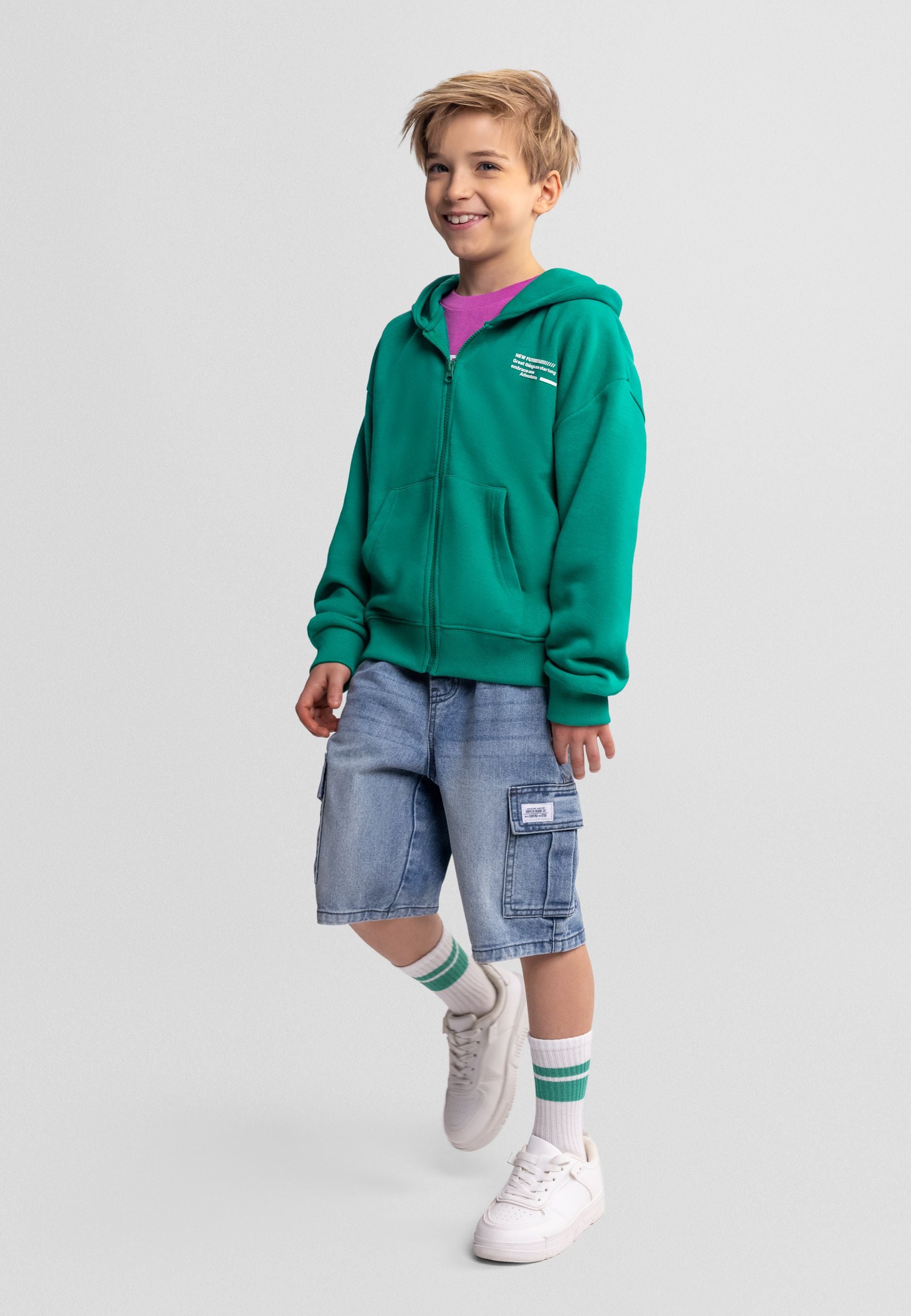 Two pairs of light blue denim cargo shorts with elastic waistbands laid flat on white background, showing different wash tones