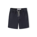 Close-up of navy blue cotton shorts showing front view with elastic waistband and white drawstring ties against white background